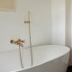 Omnires Modern maišytuvas voniai su rankinio dušelio komplektu, aukso spalva